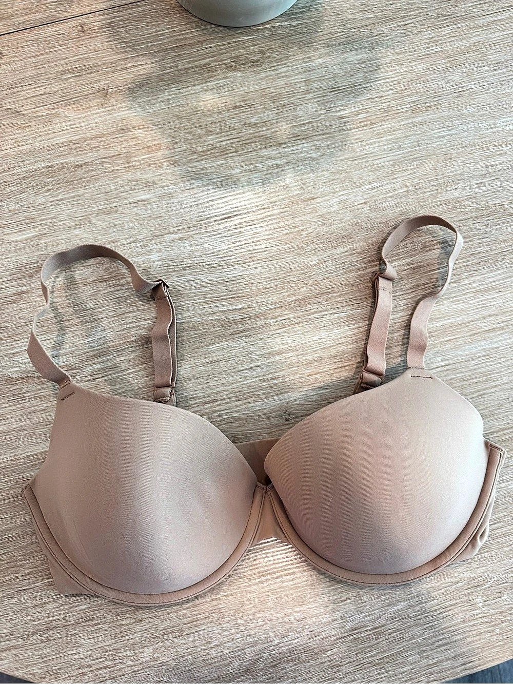 SKIMS Fits Everybody T-Shirt Bra in a nude/beige shade, size 36D.